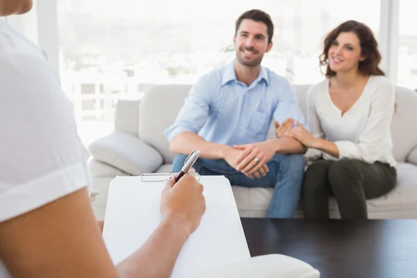 Happy Husband and Wife during Marriage Therapy session